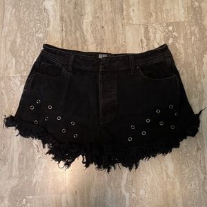 Frayed hi rise shorts with eyelet cut outs